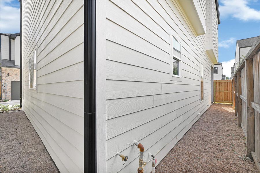 Exterior details and patio area of a home in , Houston (Image 4). Exterior details and patio area of a home in , Houston (Image 4).