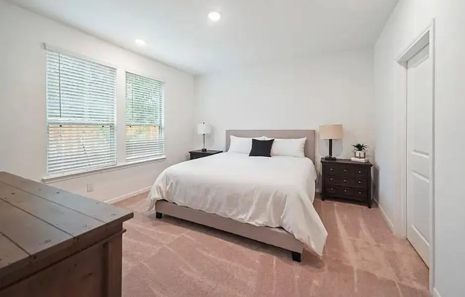 Furnished interior view inside a new home in The Pines At Seven Coves, Conroe (Image 5).