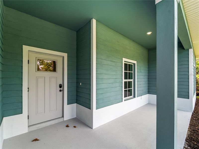 Exterior details and patio area of a home in , North Port (Image 28).