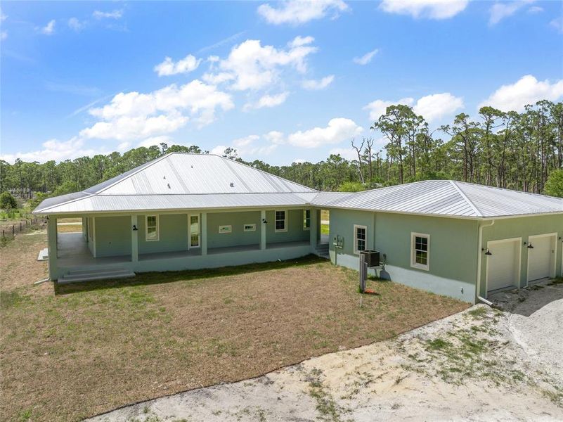 Front exterior of a new home in , North Port, FL, highlighting curb appeal (Image 16).