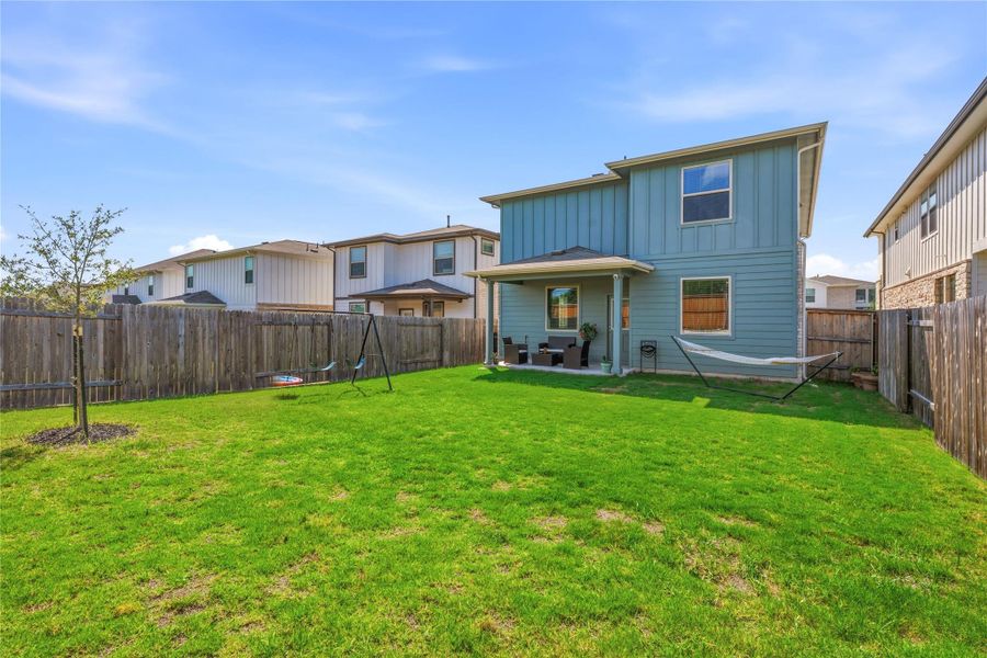 Exterior details and patio area of a home in Crosswinds, Kyle (Image 24).