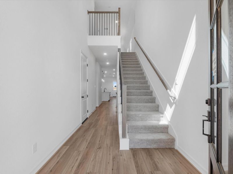 Home entry. Sample product photo. Actual exterior and interior selections may vary by homesite. Photo may be virtually staged.