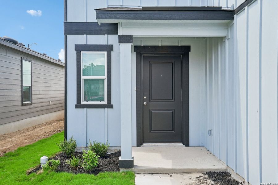 Exterior details and patio area of a home in Medina Crossing, Von Ormy (Image 3).