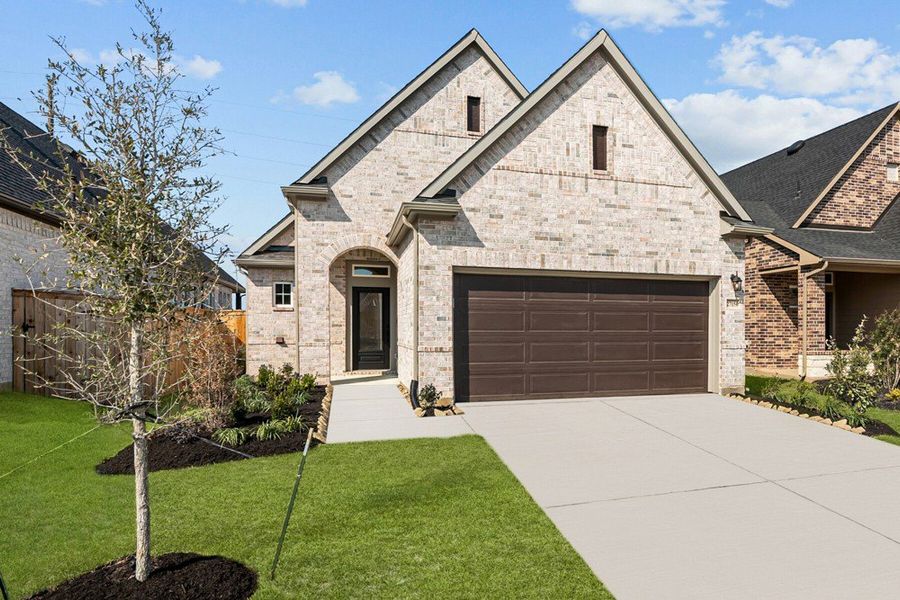 Representative exterior photo of a completed home built from the The Stonewood by David Weekley Homes in The Grand Prairie 40’, Hockley, TX (Image 1).