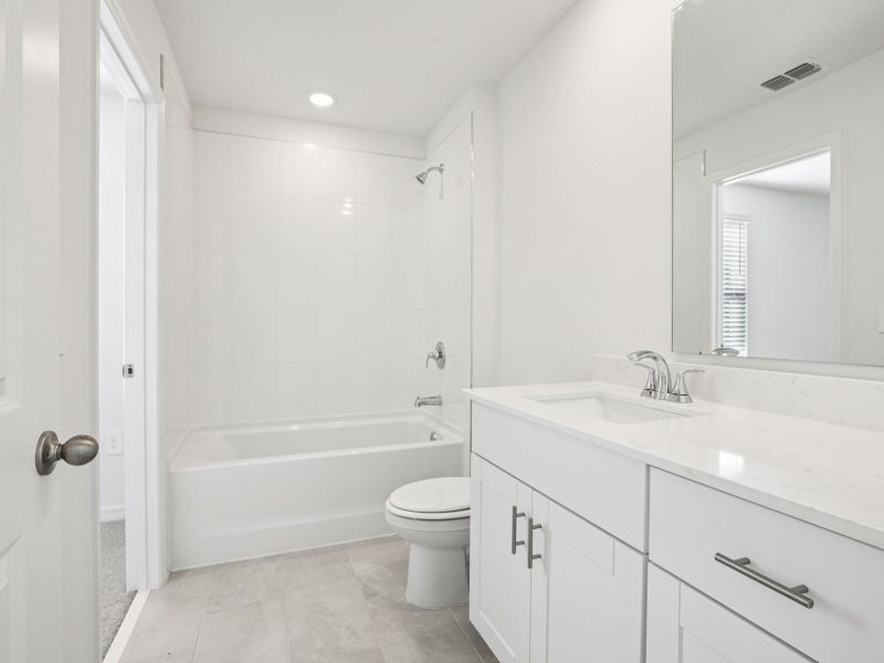 Furnished interior view inside a new home in The Reserve at Hammock Oaks Townes, Lady Lake (Image 6).