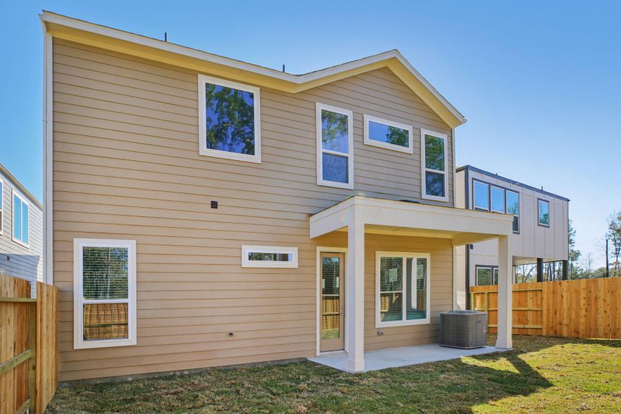 Exterior details and patio area of a home in Pinewood Trails - Luxe Series, Atascocita (Image 26).