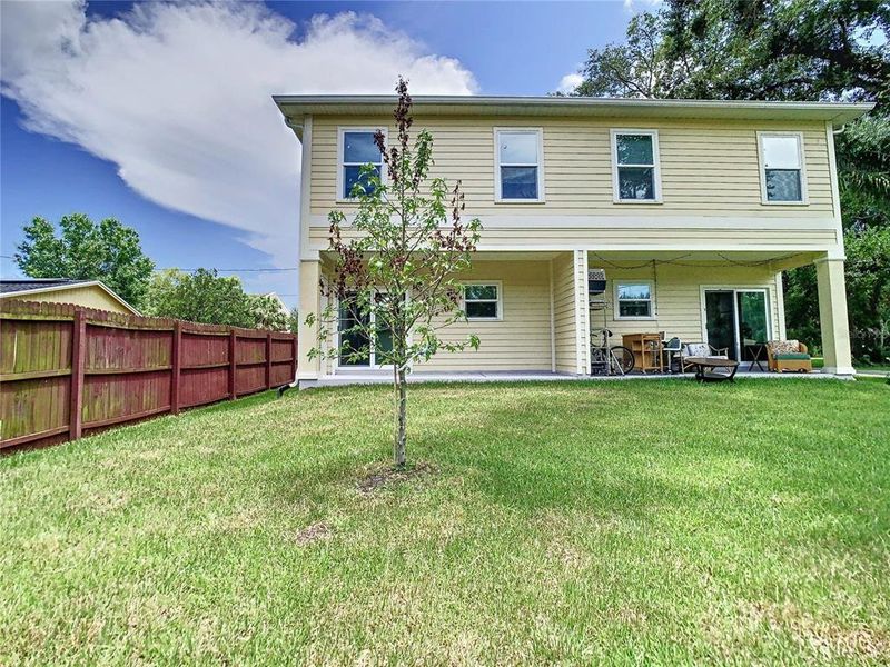 Front exterior of a new home in , Tampa, FL, highlighting curb appeal (Image 26).