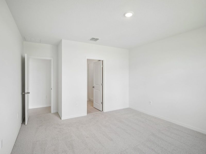 Spacious, unfurnished interior of a new home in The Reserve at Van Oaks, Auburndale (Image 15).