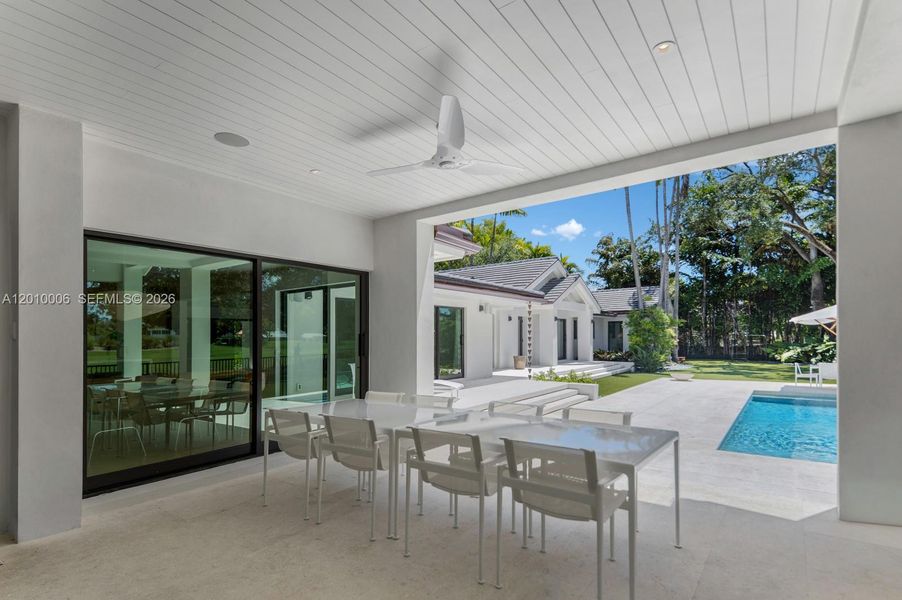 Exterior details and patio area of a home in , Coral Gables (Image 4).