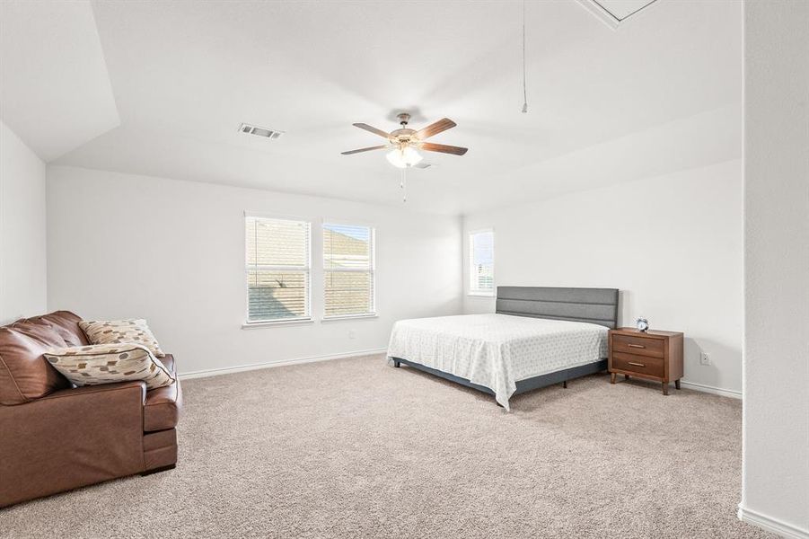 Upstairs open flex room (loft) great for a game room, private bedroom, etc., with full bathroom.