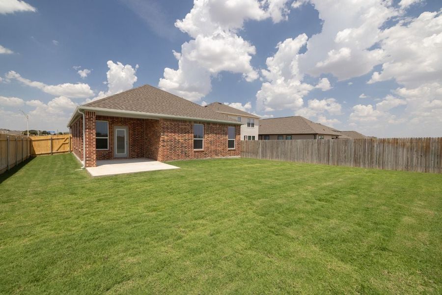 Exterior details and patio area of a home in Overlook Ranch, Georgetown (Image 17).
