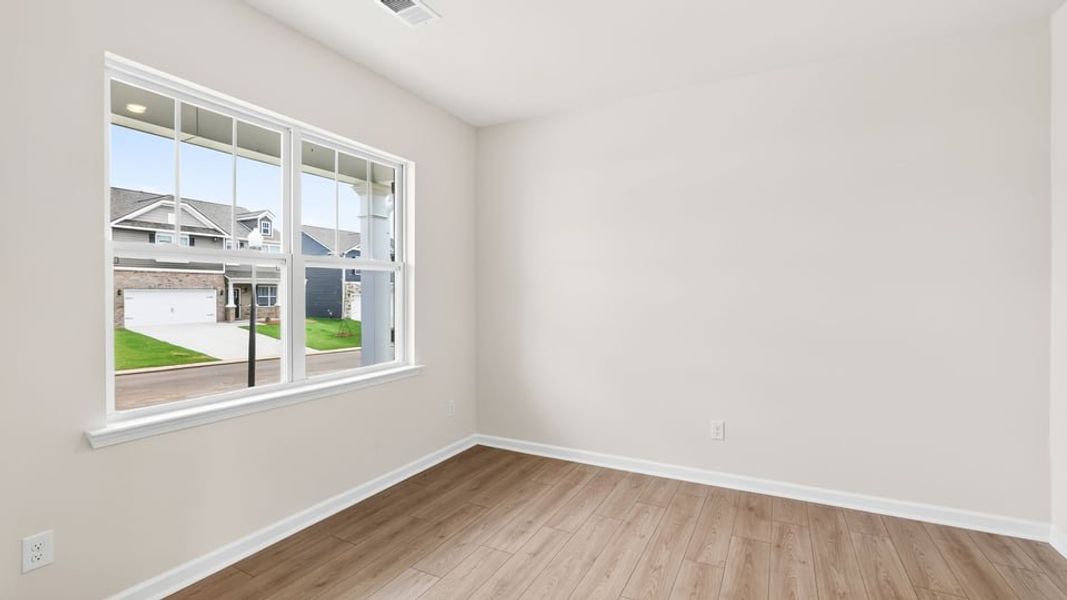 Spacious, unfurnished interior of a new home in Durbin Meadows Traditions, Fountain Inn (Image 19).