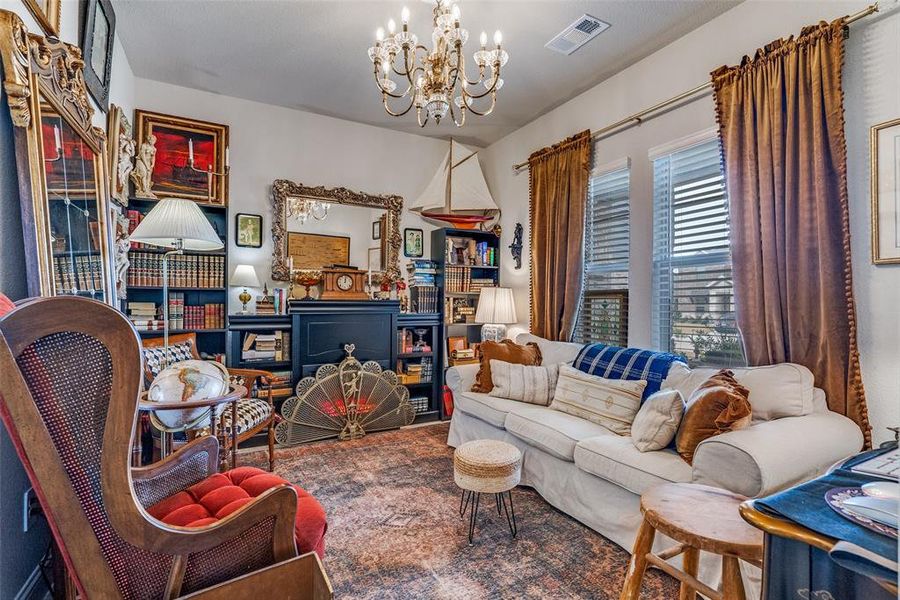 Sitting room with a chandelier Sitting room with a chandelier