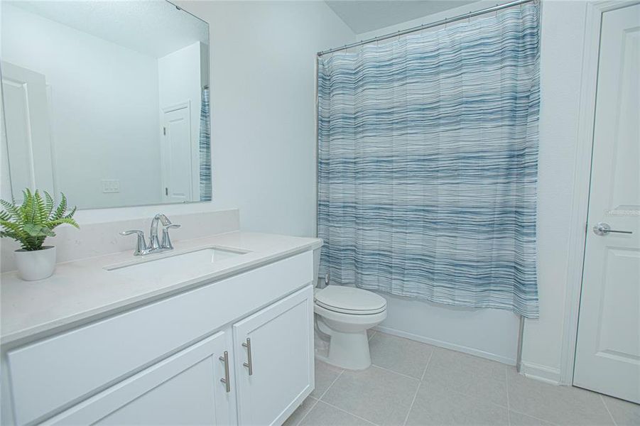 Furnished interior view inside a new home in Tohoqua, Kissimmee (Image 7).