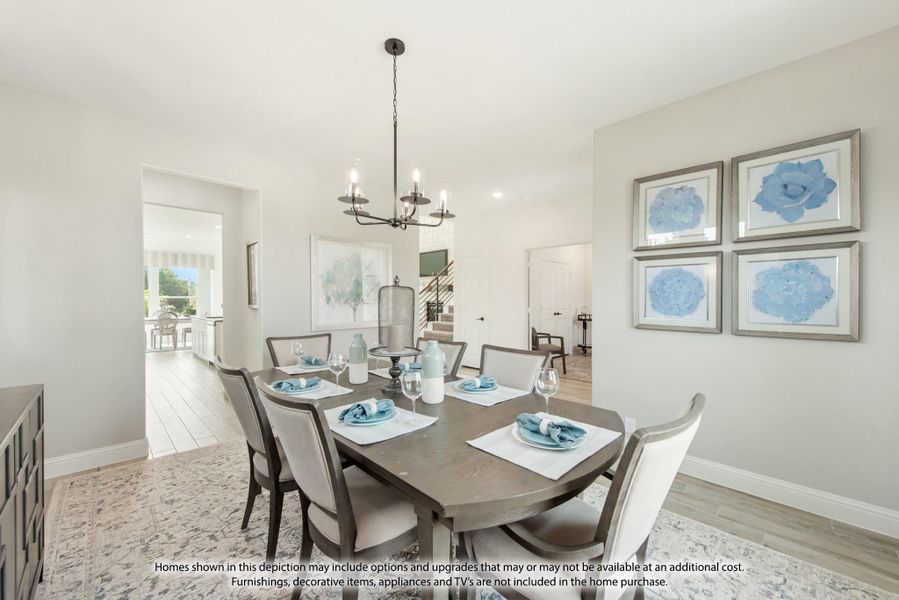 Dining room with wood table, six chairs, chandelier, and light hardwood floors Dining room with wood table, six chairs, chandelier, and light hardwood floors