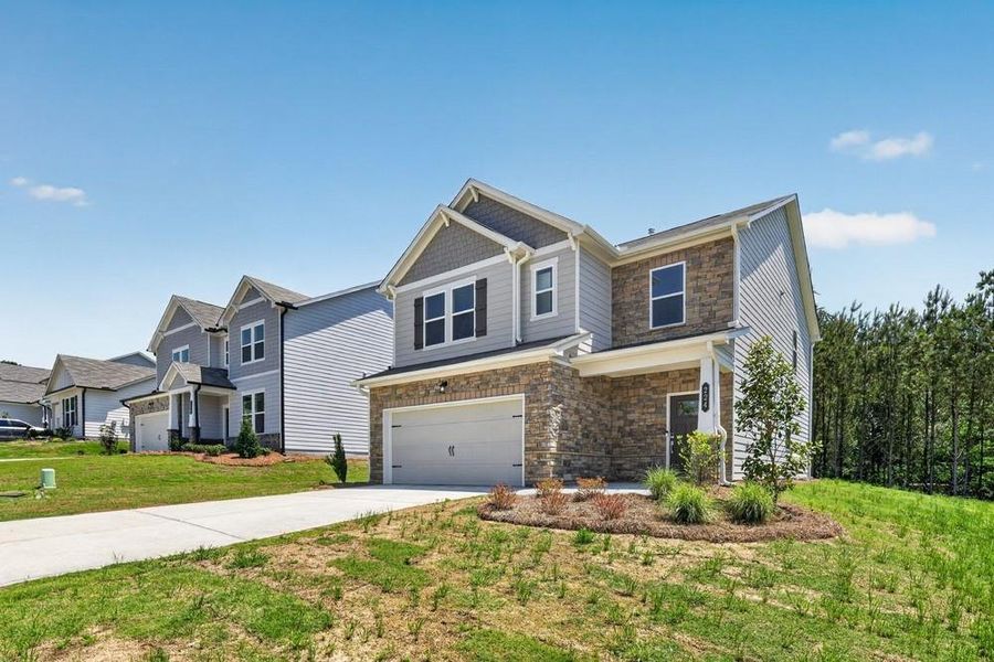 Front exterior of a new home in Heritage River, Euharlee, GA, highlighting curb appeal (Image 2). Front exterior of a new home in Heritage River, Euharlee, GA, highlighting curb appeal (Image 2).