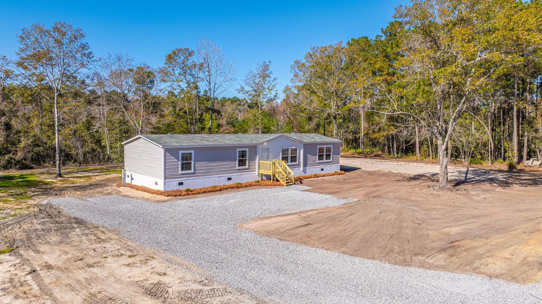 Exterior details and patio area of a home in , Pinopolis (Image 24).