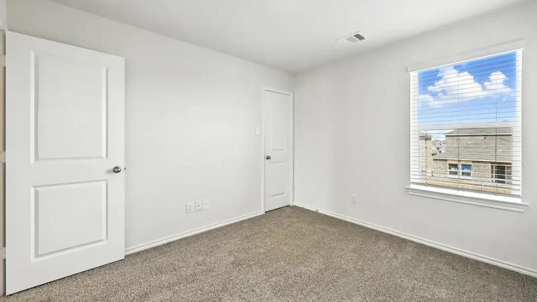 Representative unfurnished interior of a home built from the Grace by D.R. Horton in Crossmill, Princeton (Image 10).