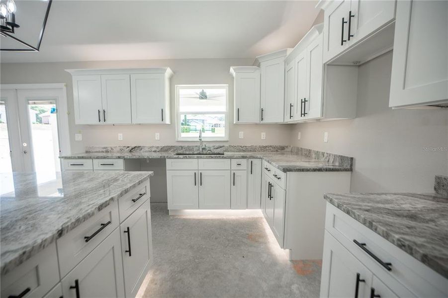 Furnished interior view inside a new home in , Dunnellon (Image 5).