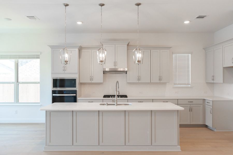 Furnished interior view inside a new home in Valencia on the Lake, Little Elm (Image 5).