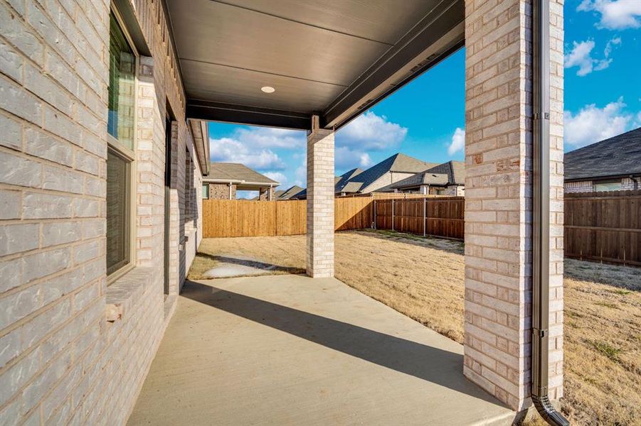 Exterior details and patio area of a home in Stonehaven, Seagoville (Image 2). Exterior details and patio area of a home in Stonehaven, Seagoville (Image 2).