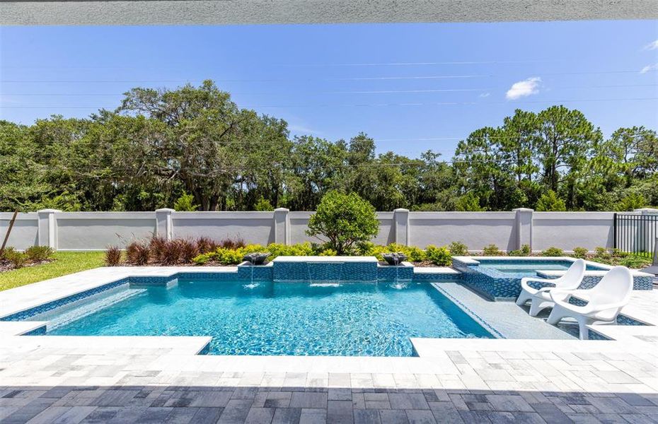 Exterior details and patio area of a home in The Estates at Nona Sound, Orlando (Image 24). Exterior details and patio area of a home in The Estates at Nona Sound, Orlando (Image 24).