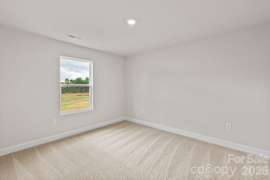Spacious, unfurnished interior of a new home in Ascot Woods, Charlotte (Image 9).