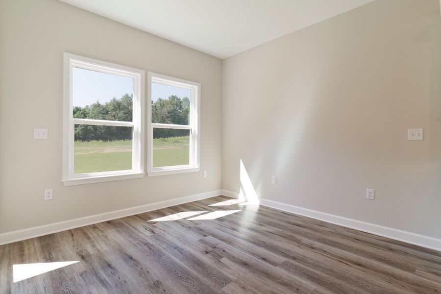 Representative unfurnished interior of a home built from the Maybell III by CJL Homes in Barton's Bend, Crestview (Image 11).