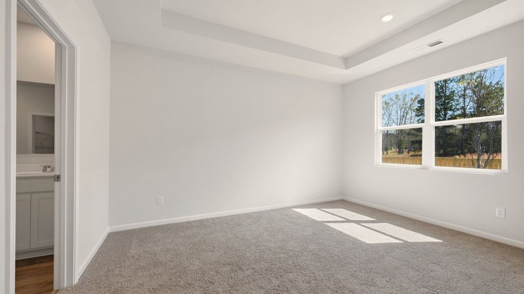 Spacious, unfurnished interior of a new home in The Reserve at Calcutta, Stockbridge (Image 24).