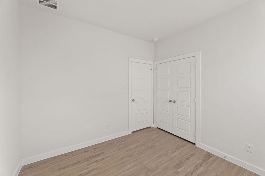 Representative unfurnished interior of a home built from the Clovis by Hakes Brothers in Hunters Ranch, San Antonio (Image 21).