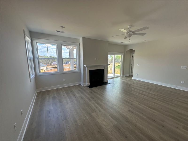This bright living space features elegant flooring