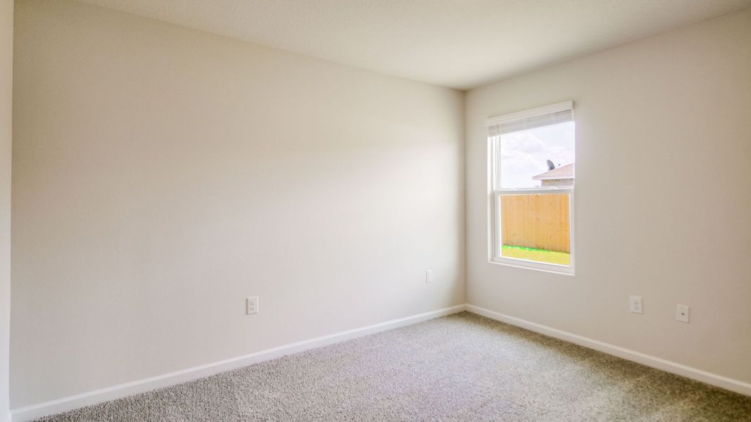 Spacious, unfurnished interior of a new home in The Enclave at Bar W Ranch, Baker (Image 27).