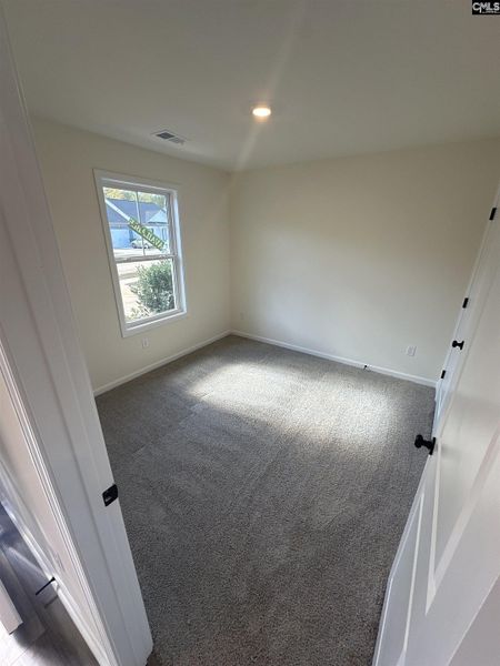 Spacious, unfurnished interior of a new home in Piney Woods Bluff, Columbia (Image 11).