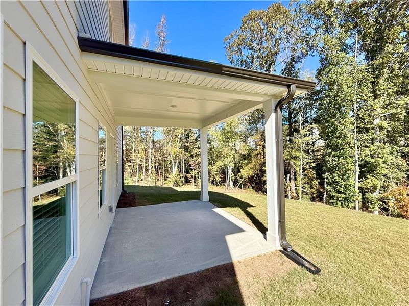 Exterior details and patio area of a home in Vines at Mill Creek - Estate Series, Braselton (Image 2). Exterior details and patio area of a home in Vines at Mill Creek - Estate Series, Braselton (Image 2).