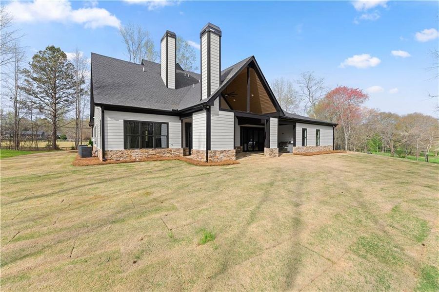 Exterior details and patio area of a home in , Ball Ground (Image 31).