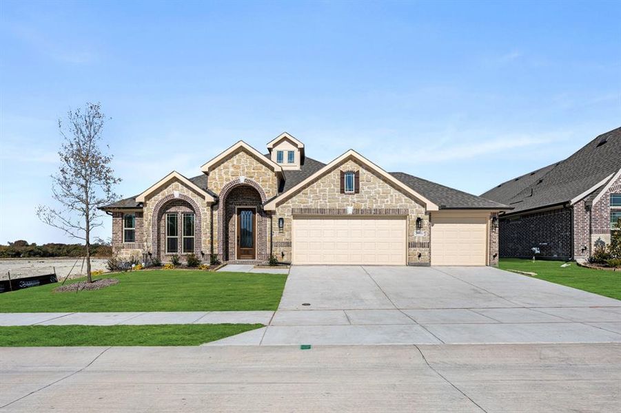 Front exterior of a new home in Meadow Vista 60-65, Anna, TX, highlighting curb appeal (Image 25). Front exterior of a new home in Meadow Vista 60-65, Anna, TX, highlighting curb appeal (Image 25).
