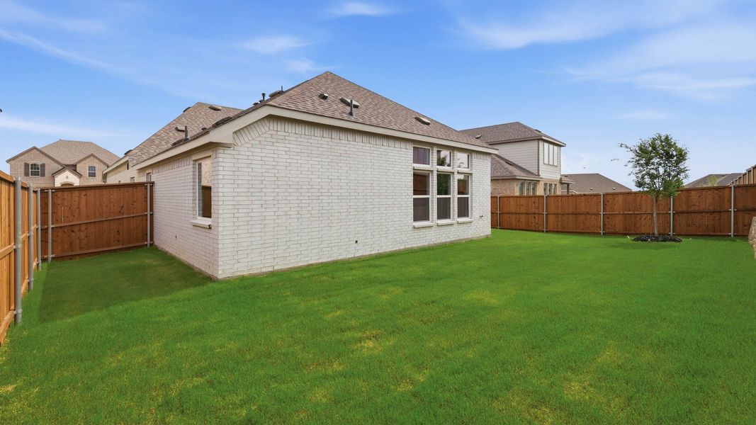 Exterior details and patio area of a home in Anna Ranch, Anna (Image 22).