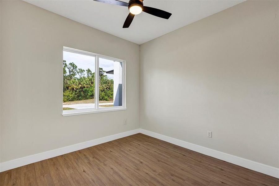 Spacious, unfurnished interior of a new home in , Port Charlotte (Image 27).