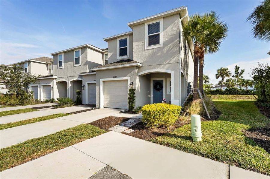 Front exterior of a new home in , Sarasota, FL, highlighting curb appeal (Image 23). Front exterior of a new home in , Sarasota, FL, highlighting curb appeal (Image 23).