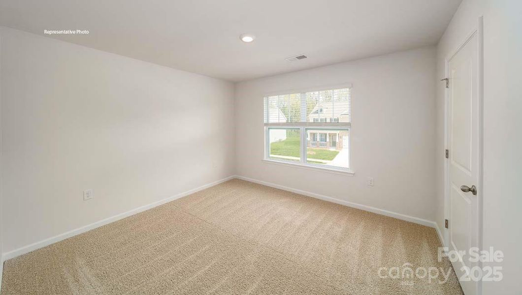 Spacious, unfurnished interior of a new home in Wallace Springs, Statesville (Image 31).