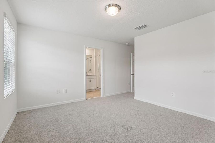 Spacious, unfurnished interior of a new home in Cagan Crossings West, Clermont (Image 23).