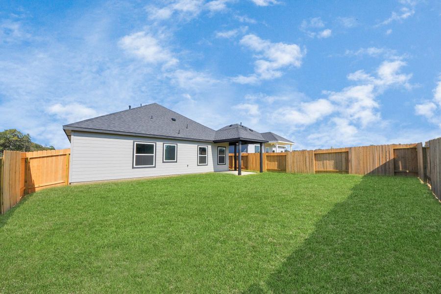Exterior details and patio area of a home in Lexington Heights, Willis (Image 4). Exterior details and patio area of a home in Lexington Heights, Willis (Image 4).