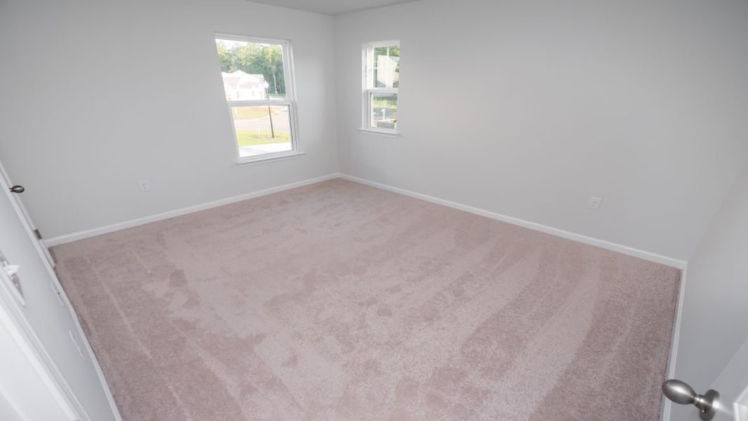 Spacious, unfurnished interior of a new home in Cedar Hill Landing, Navassa (Image 34).
