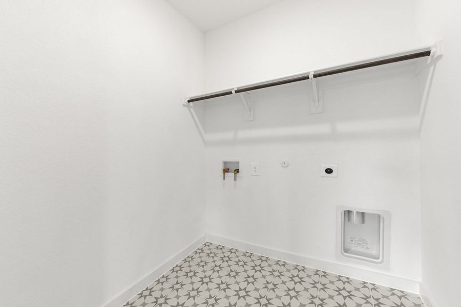 Representative unfurnished interior of a home built from the Olive III Harrington Trails Cornerstone I Series by Brohn Homes in Harrington Trails, New Caney (Image 26).