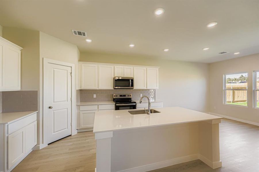 Furnished interior view inside a new home in MiraVerde, Crowley (Image 4).