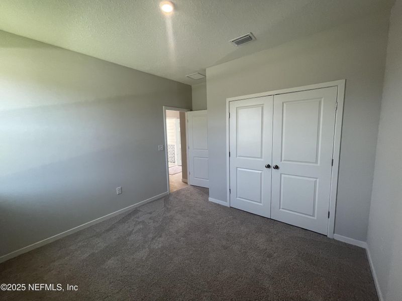 Spacious, unfurnished interior of a new home in Magnolia Series at Seminole Palms, Palm Coast (Image 18).