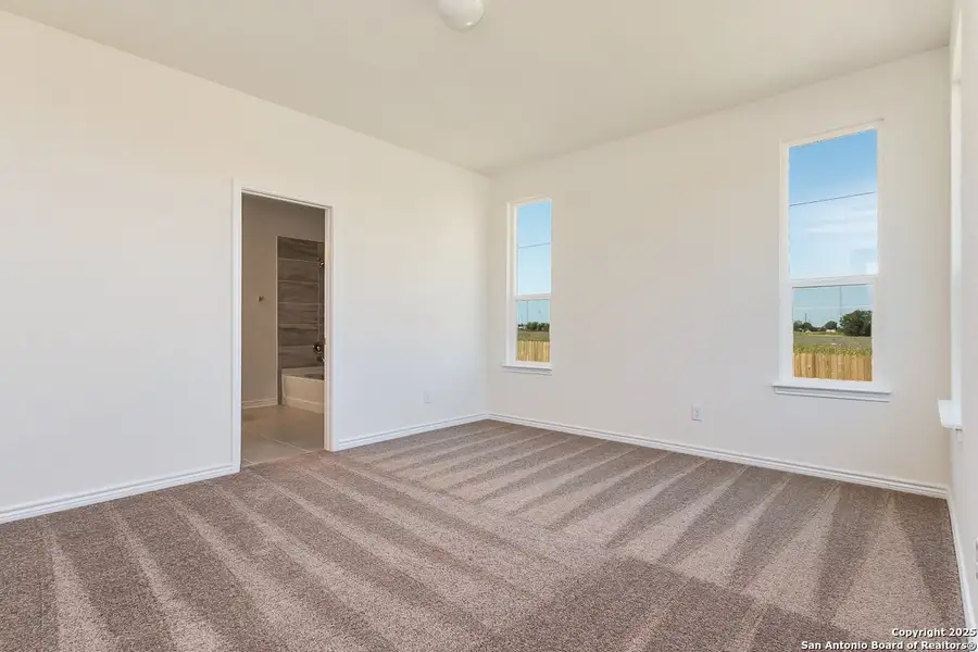 Spacious, unfurnished interior of a new home in Woodside Farms, Seguin (Image 5). Spacious, unfurnished interior of a new home in Woodside Farms, Seguin (Image 5).