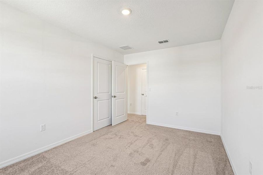 Spacious, unfurnished interior of a new home in Tyson Reserve, St. Cloud (Image 7).