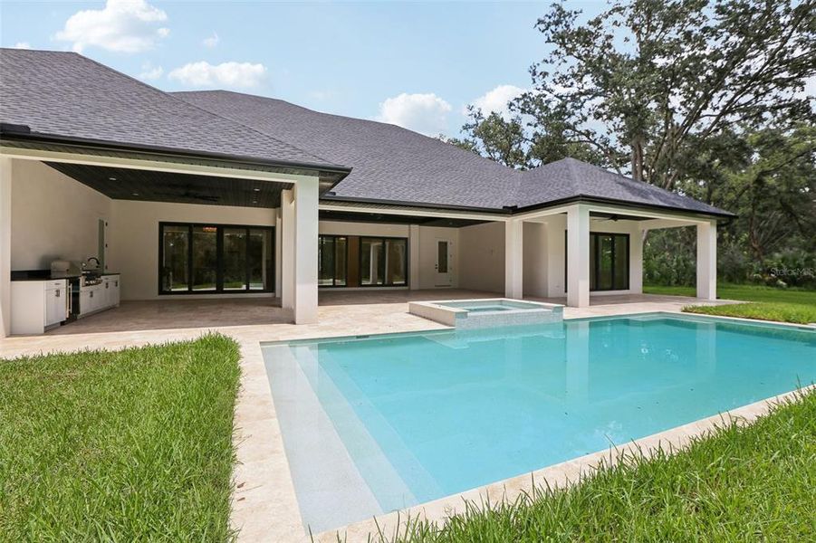 Front exterior of a new home in , Lutz, FL, highlighting curb appeal (Image 2).