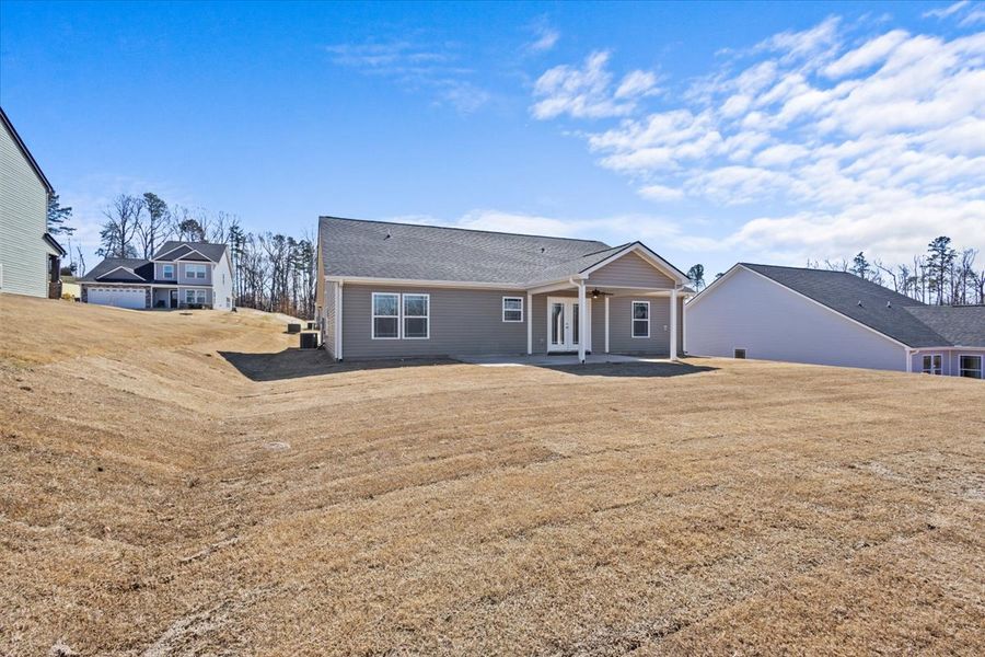 Representative exterior photo of a completed home built from the Brentwood by Enchanted Homes in Mills Gin, Campobello, SC (Image 16).